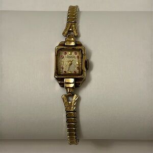 Benrus vintage 1950’s 10k RGP dainty bracelet watch with ruby crystals 6.5in‎